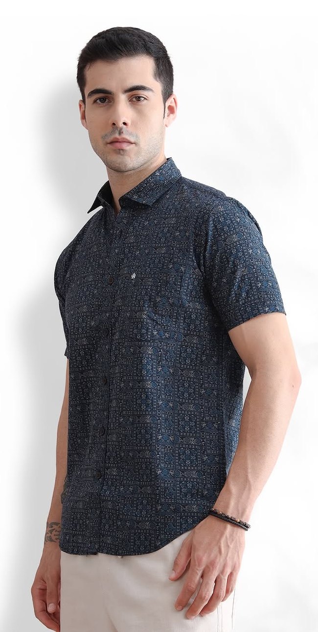 Model in navy abstract-print short sleeve shirt